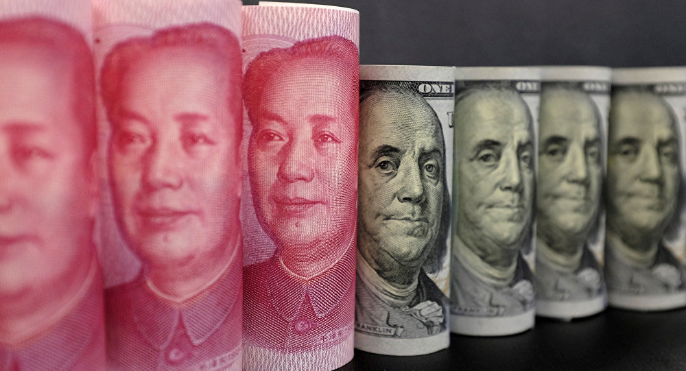 La Chine riposte aux USA et dévalue le yuan face au dollar