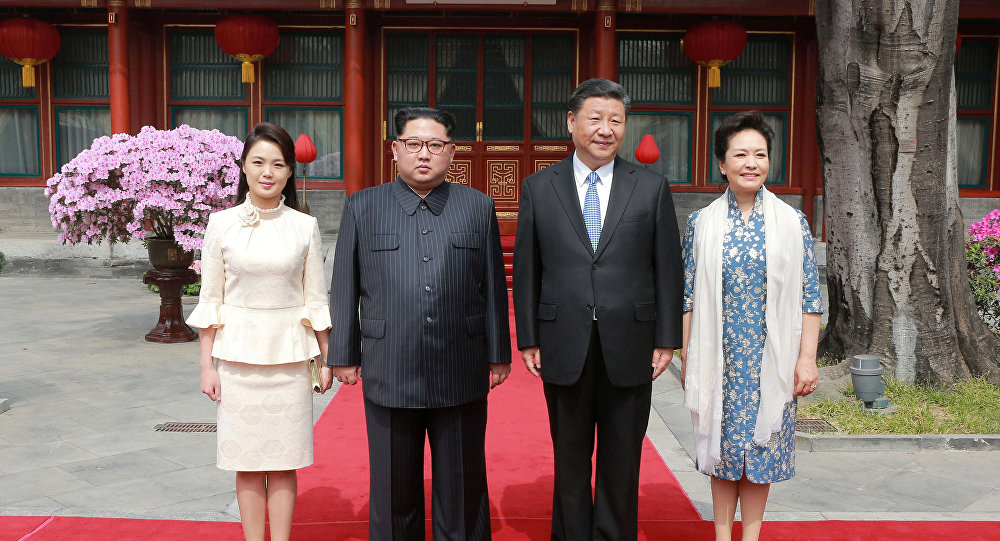 Quand les trois tenues de l’épouse de Kim Jong-un mettent la Chine en émoi (Photos)