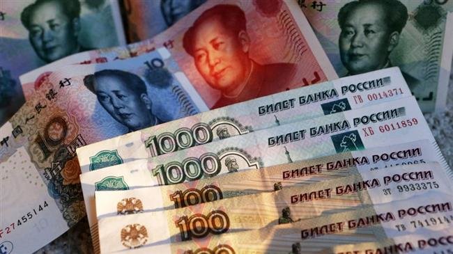 La Russie et la Chine préparent un accord pour supprimer le dollar